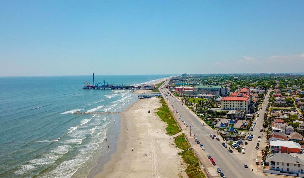 An aerial view of Pleasure Pier and the Seawall