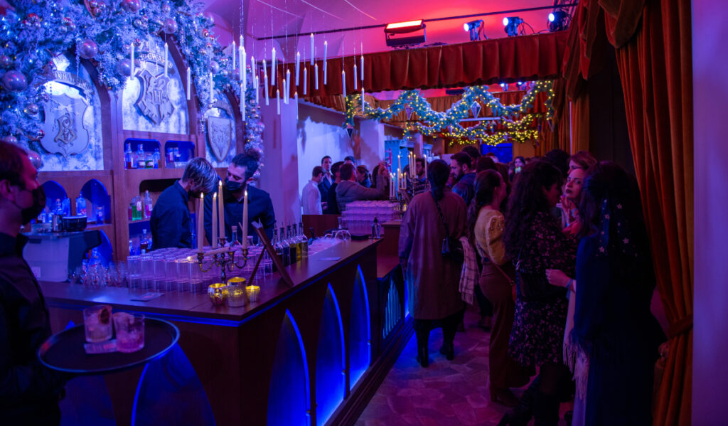 A decorated bar and patrons