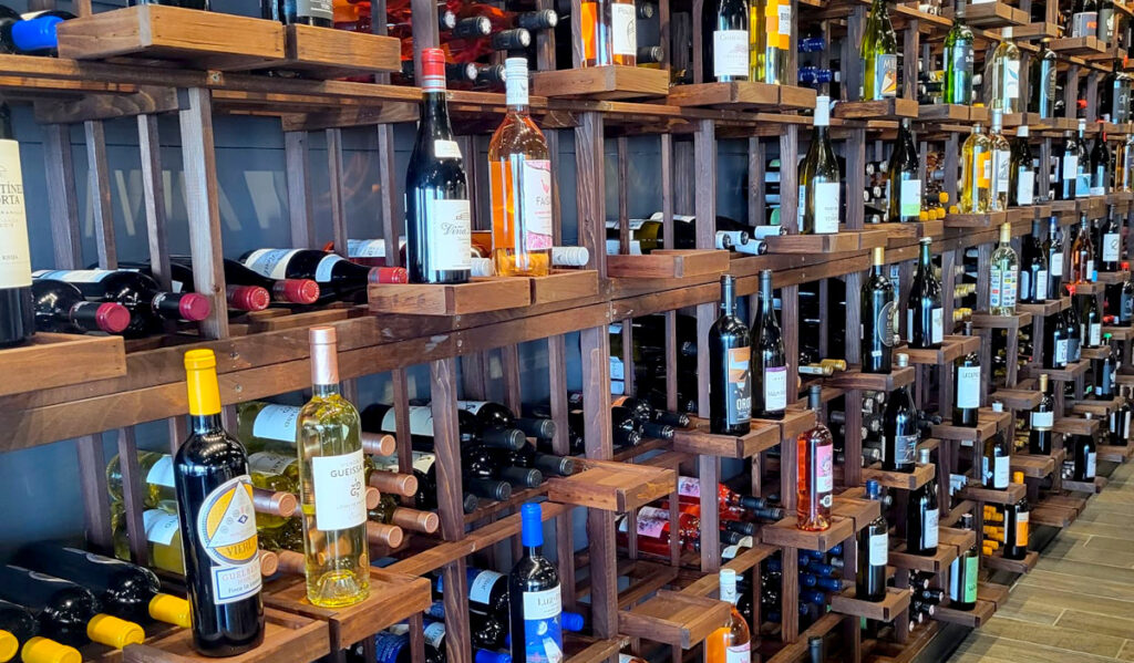 Dozens of wine bottles on display available for purchase