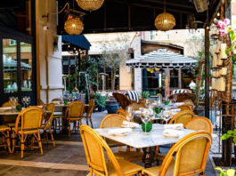 An outdoor patio with dining seating