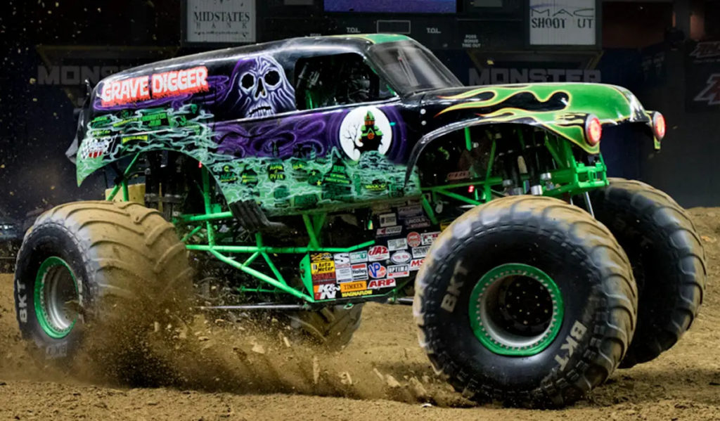 The Grave Digger monster truck skids in dirt