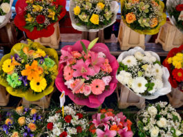 Flower arrangements for sale at a flower stand
