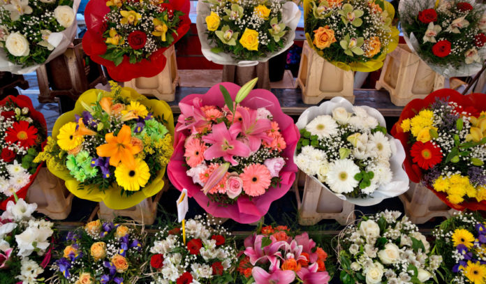 Flower arrangements for sale at a flower stand