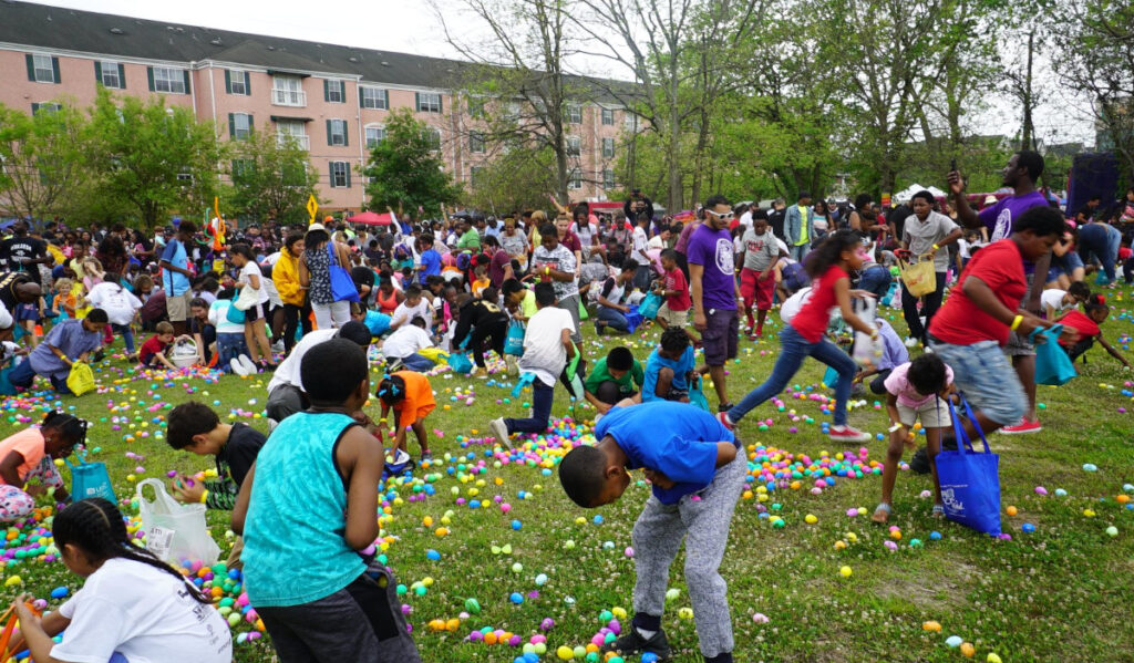 Kids scramble to gather Easter eggs on the ground