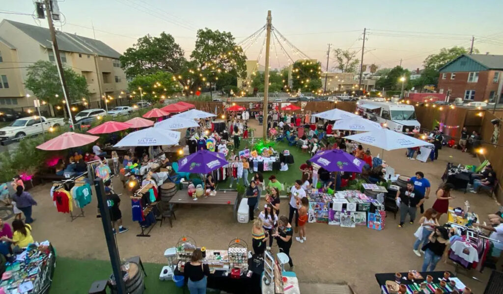 An overhead view of a bustling marketplace at dusk