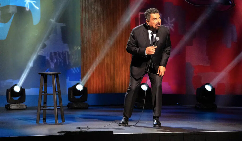 George Lopez makes a face to the crowd as he performs on stage