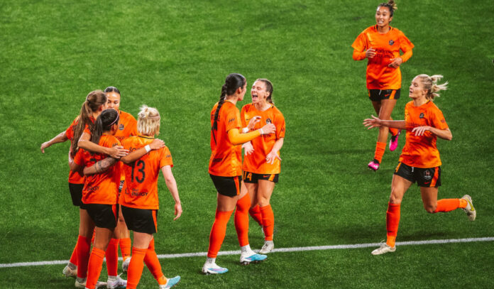 Hosuton Dash players celebrate after a goal