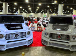 Two custom vehicles in the foreground of a car show