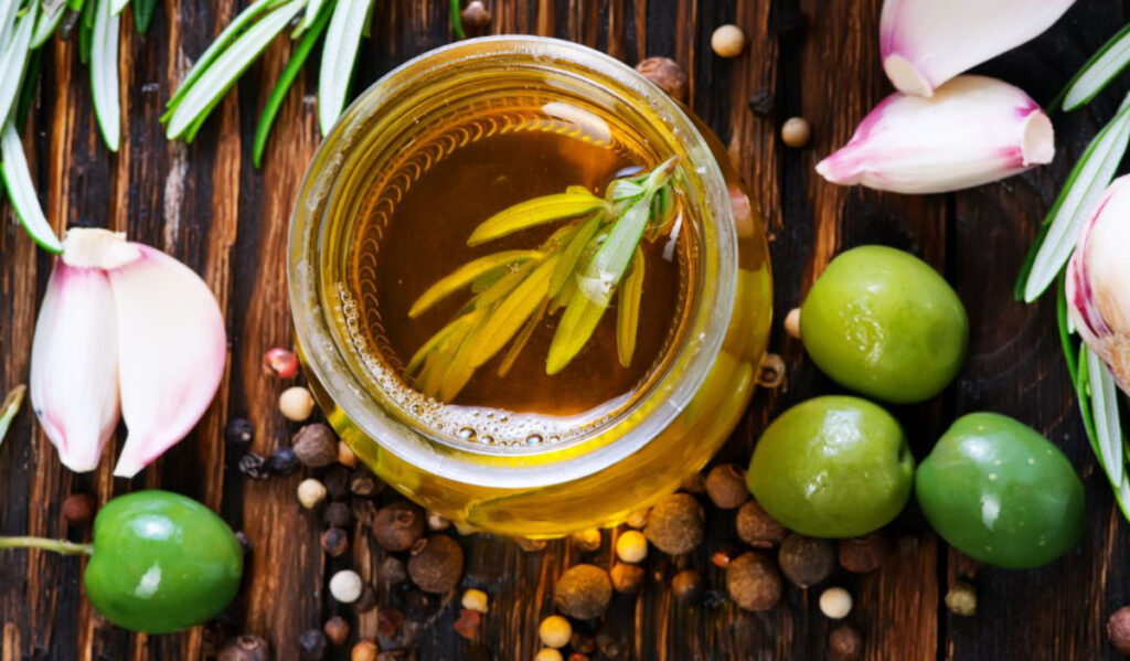 A promotion photo from above of a jar of olive oil
