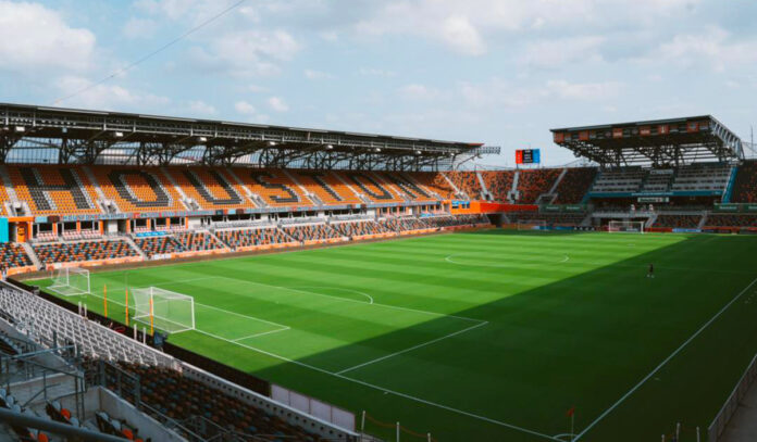 An empty Shell Energy Stadium with "Houston" spelled out on the seats