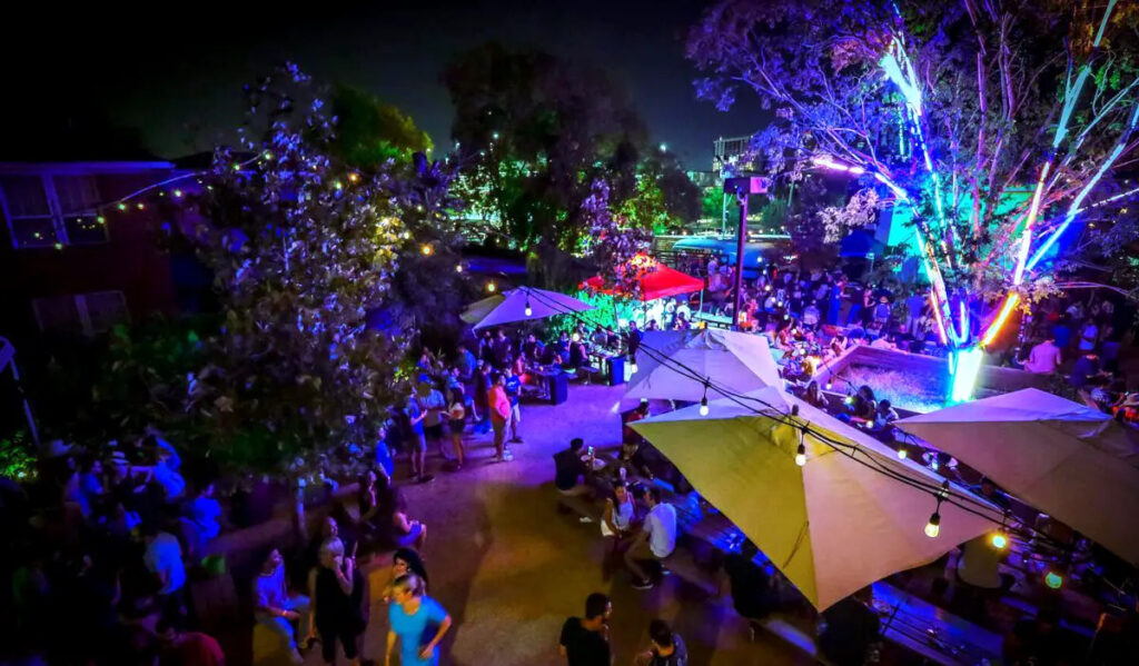 An aerial view at night of the Axelrad Beer Garden patio