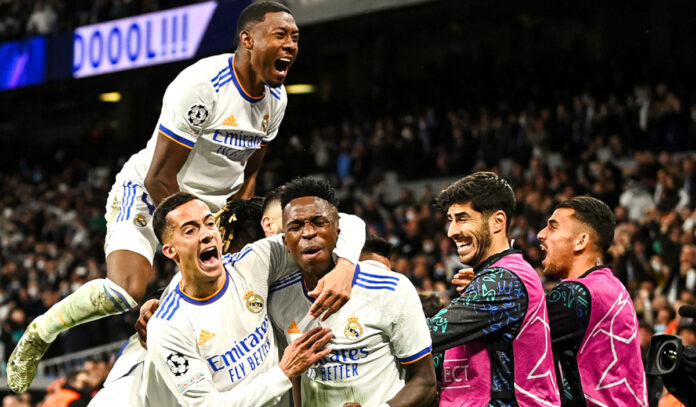 Players of Real Madrid celebrate a goal together