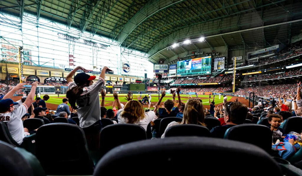 A view from the lower stands of Minute maid Park, as fans do "the wave" during a baseball game