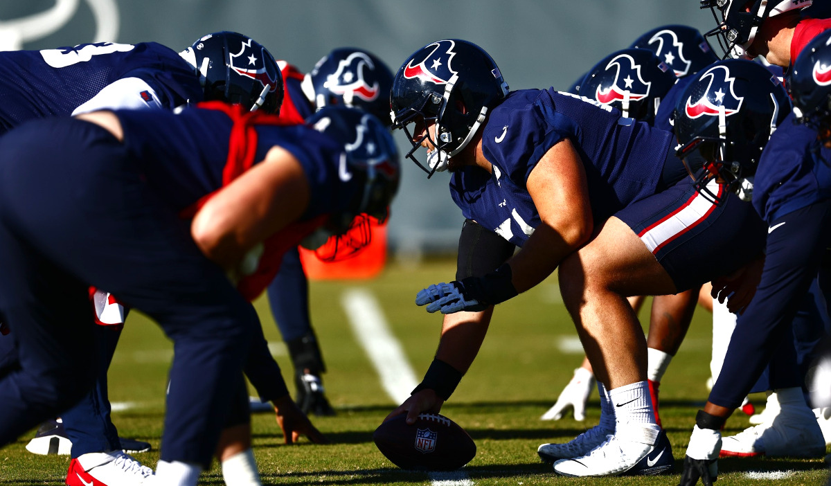 Two Texans squads lineup for a snap training
