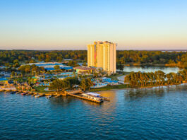An aerial view of Margaritaville on Lake Conroe at twilight