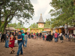 Crowds of people walking through a renaissance fair