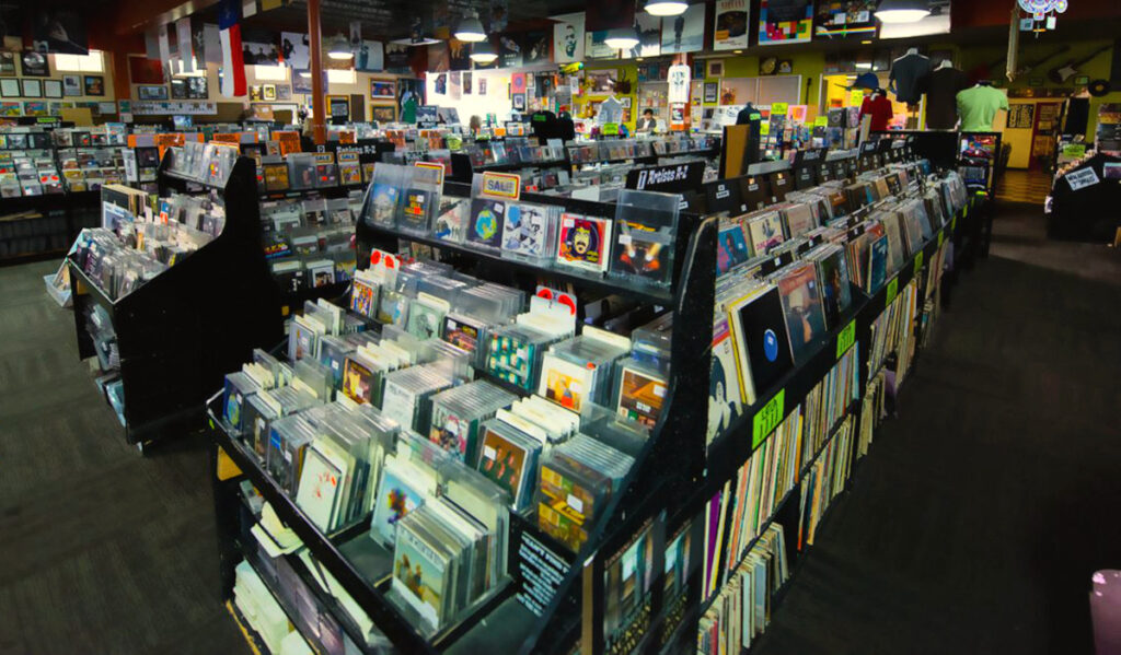 Interior of Cactus Music with rows of CDs and Vinyl records