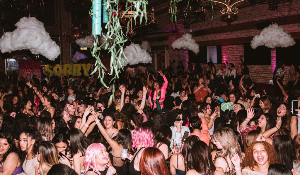 A dance floor filled with women dancing