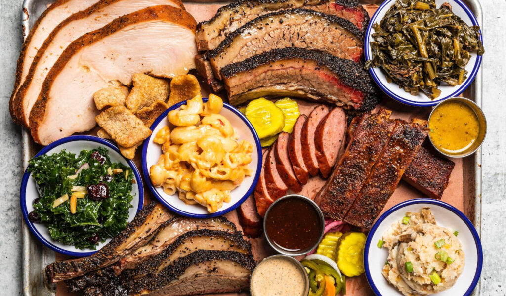 A plate of barbeque and sides