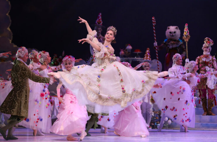 A ballet performer leaps through the air