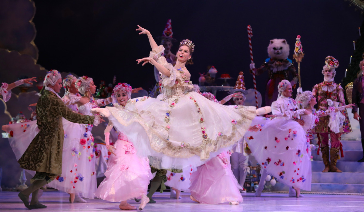 A ballet performer leaps through the air