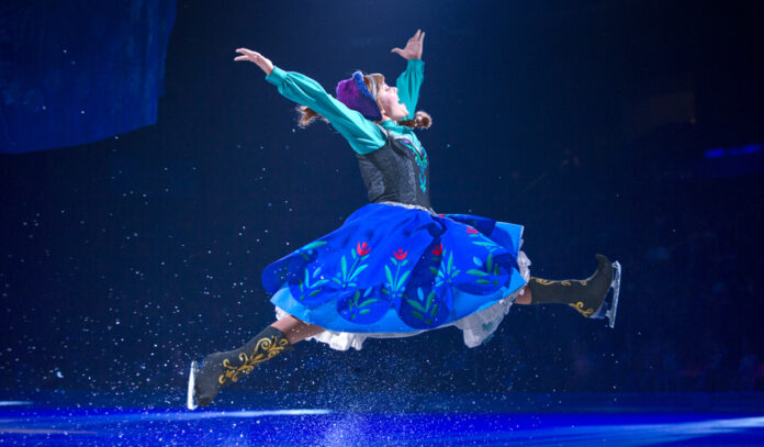 A Disney character leaping in mid-air on an ice rink