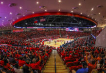 Top Games & Sports Events in Houston This Week: December 4 to 10, 2023 A wide angle of the Houston Cougars basketball arena, filled with fans during a game