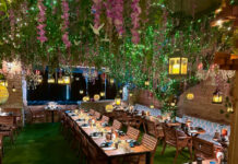 5 Must Do Things in Kemah A dining room with hanging green and pink plants