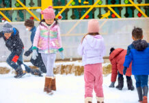 Top 15 Things to Do for Kids in Houston This Week: January 1 to 7, 2024 Children standing and playing in mounds of snow