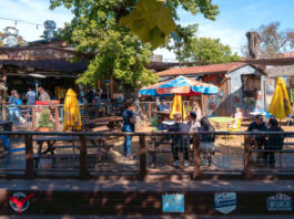 An outdoor patio at a restaurant on a sunny day