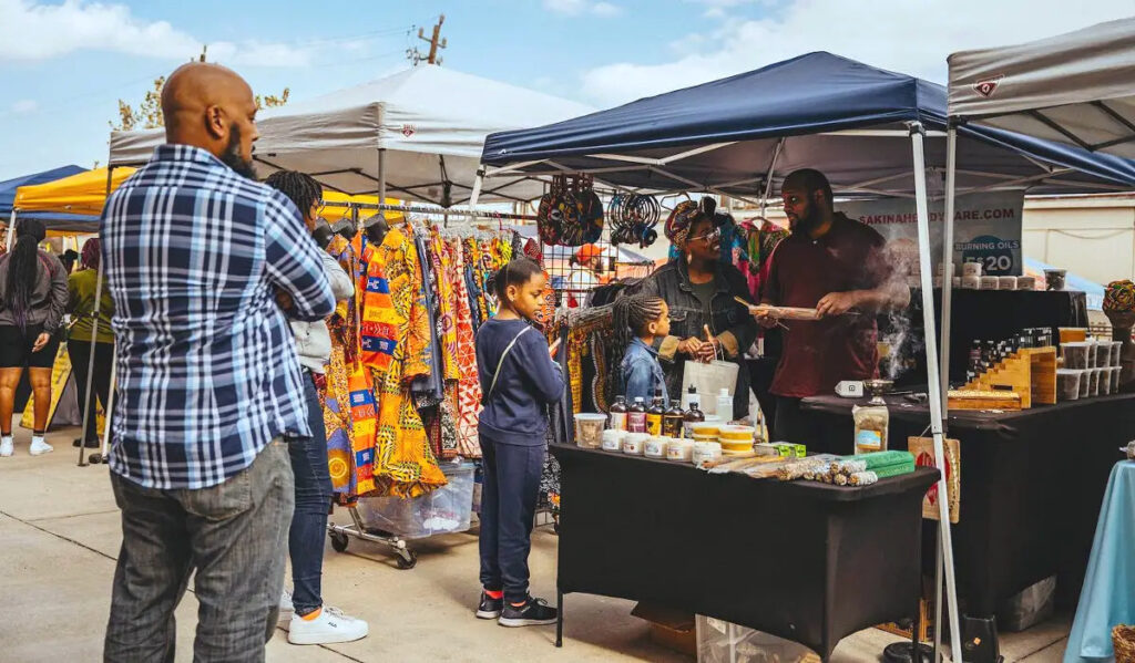 A local vendor sells wares to shoppers