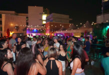 Houston Nightlife: The Best Bars in The Woodlands An outdoor bar area with people dancing