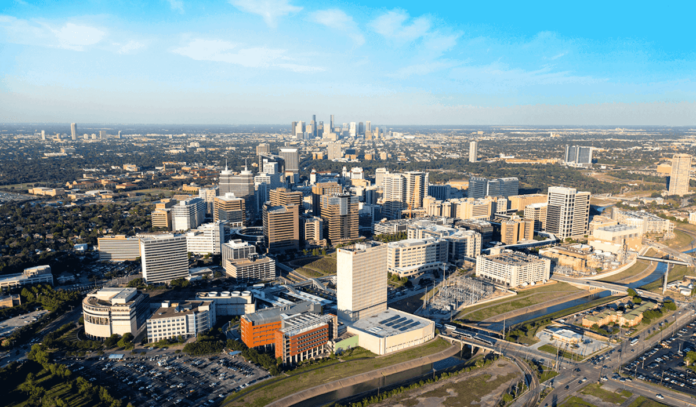 An aerial view of the Texas Medical Center with Downtown in the background