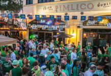 St. Patrick’s Day 2026 Parties, Celebrations & Events in Greater Houston A crowd of green-clothed people outside of a pub
