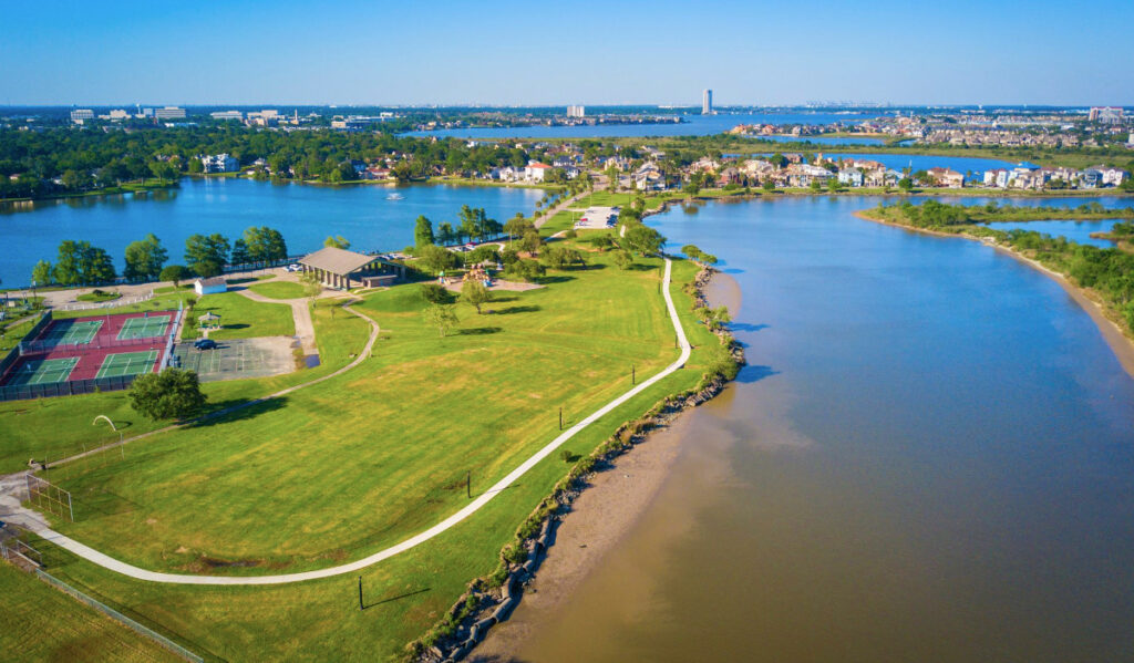 An aerial view of David Braun Park with tennis courts, running trails and playground