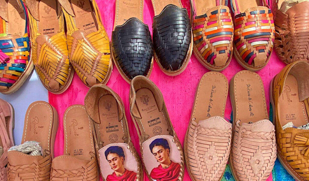 An assortment of huarache shoes with various colors and designs