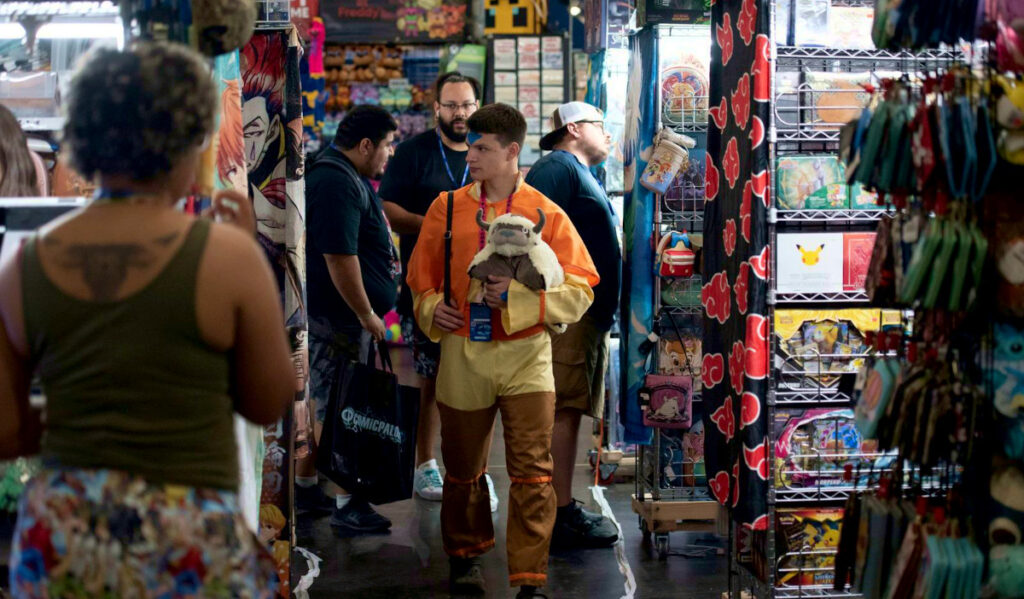 A person wearing a costume walking within a marketplace