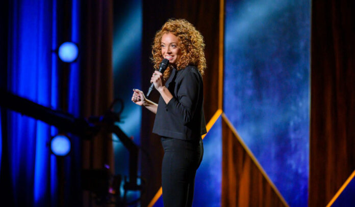 Comedian Michelle Wolf performing on stage