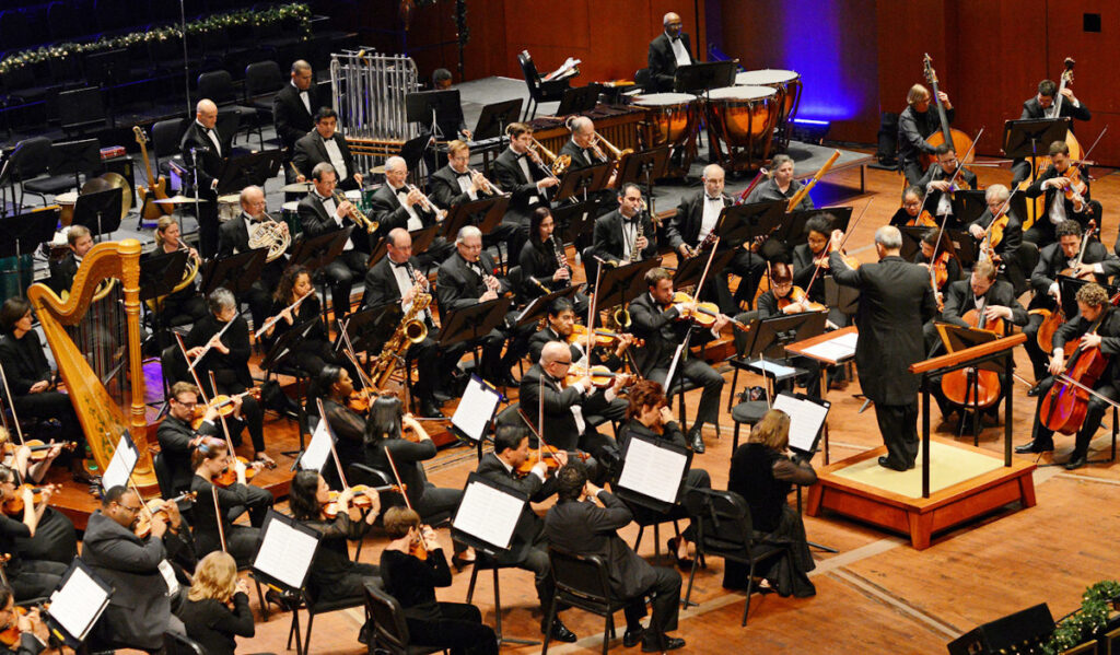 An overhead angle of an orchestra playing