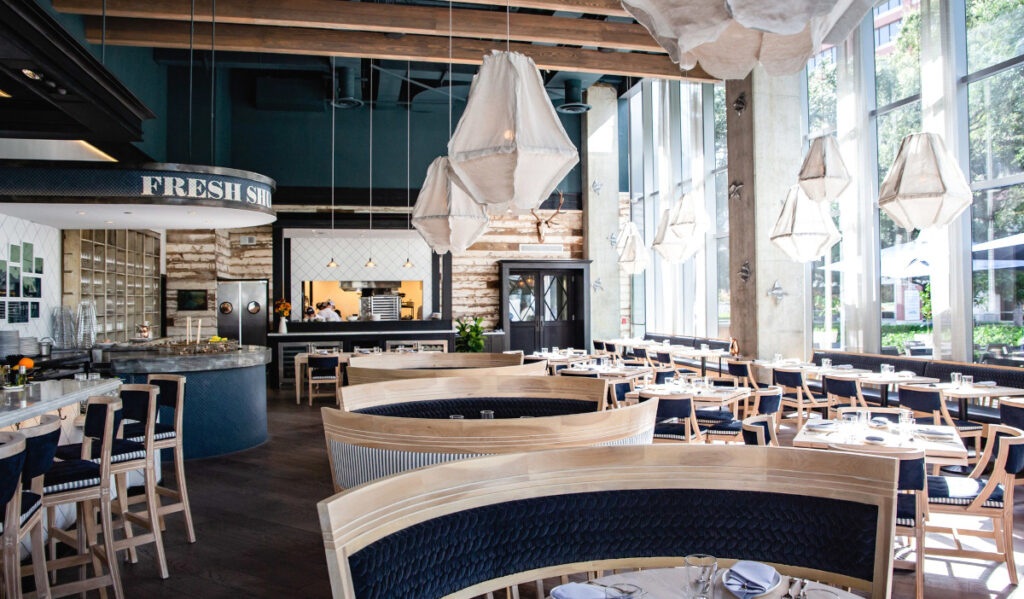 Interior of a blue and white restaurant dining room 