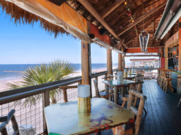 A balcony bar with views of the Galveston shore