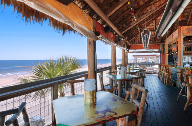 A balcony bar with views of the Galveston shore