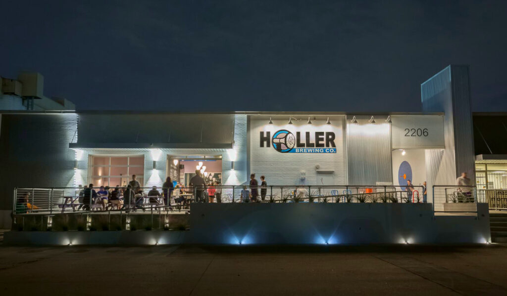 The exterior of Holler Brewery at night