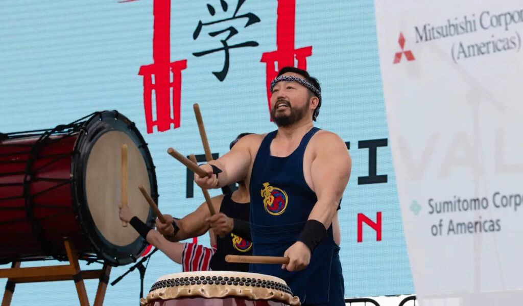 A drummer performs on stage